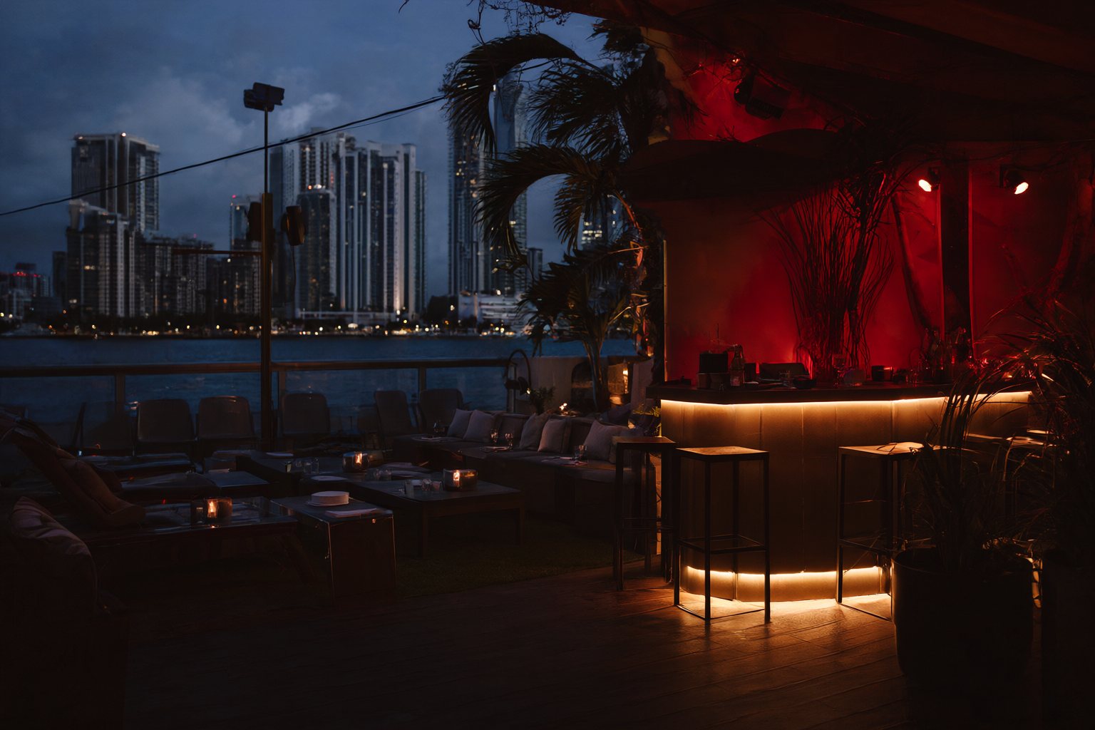 A rooftop terrace in Miami at blue hour set for a launch